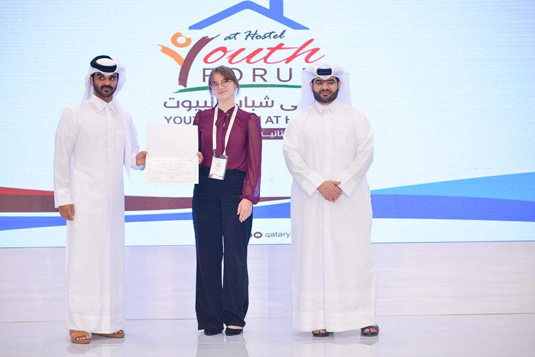 Youth participants and organisers at an official forum event in Qatar focused on sustainability, education and the future of youth tourism.