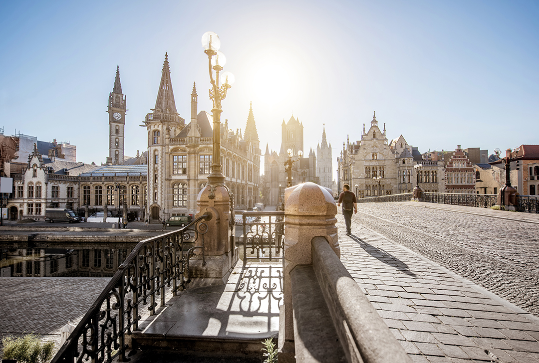 Saint Michael’s Bridge in Ghent with a view of the historic towers and medieval skyline of the city.